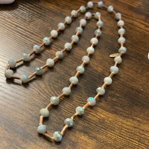 Plunder Iridescent Pale Blue Bead Necklace with Tan Cord